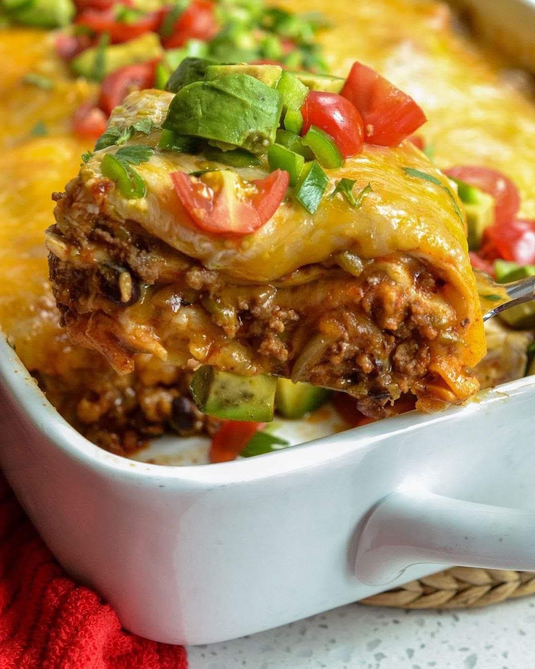 This Beef Enchilada Casserole Recipe is a family-friendly casserole packed with many hearty, wholesome ingredients.