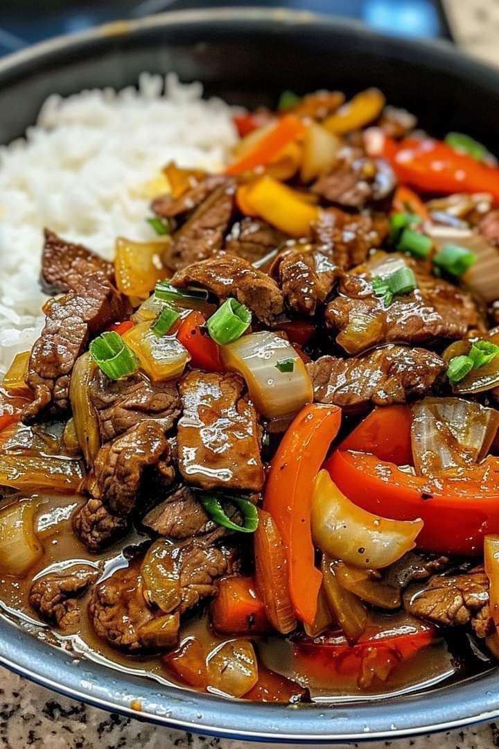 Sizzling Chinese Pepper Steak with Onions